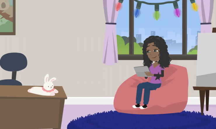 a girl sitting on a beanbag reading a book