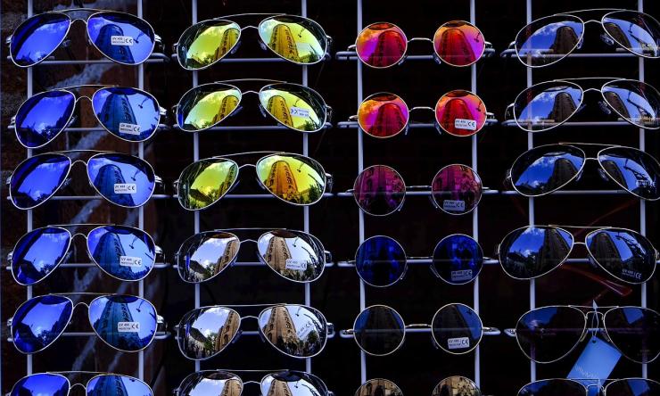 Photo of sunglasses on a display wall