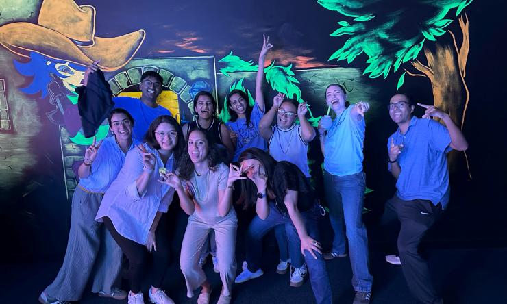 people smiling under blacklight