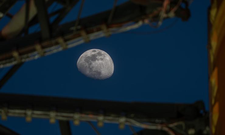 Moon Seen Shining on Full Artemis II Stack at Launch Pad 39B