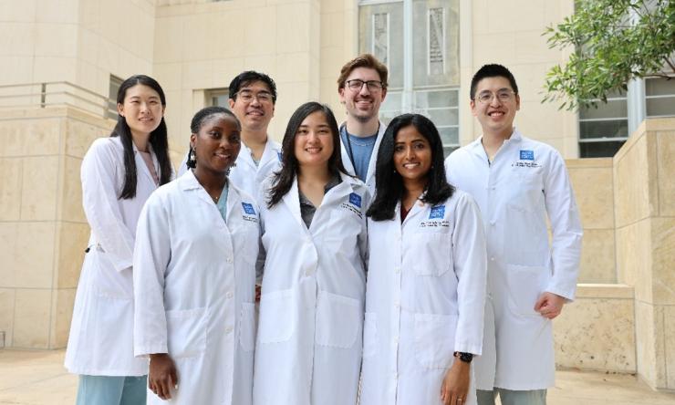 group of people in white coats