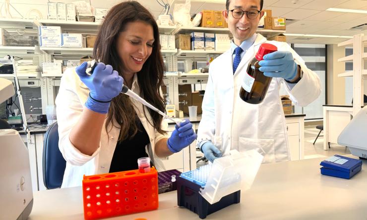 Male and female in research lab