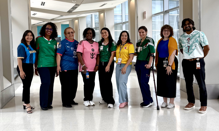 A group of BCM employees show World Cup 2026 spirit as they pose wearing their favorite team jerseys.