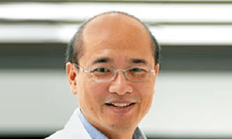 man with glasses on smiling