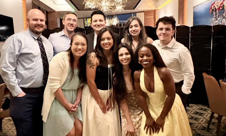The class of 2026 in formal-wear smiling