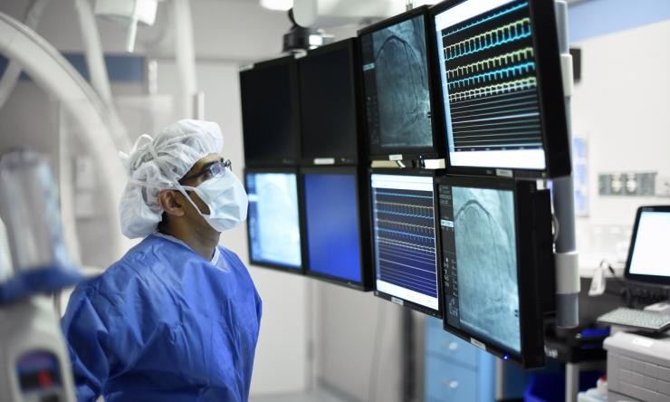 doctor looking at monitors