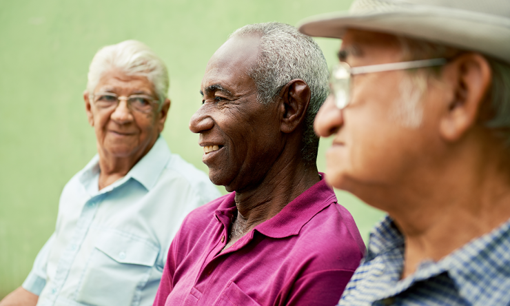 elderly men seated together