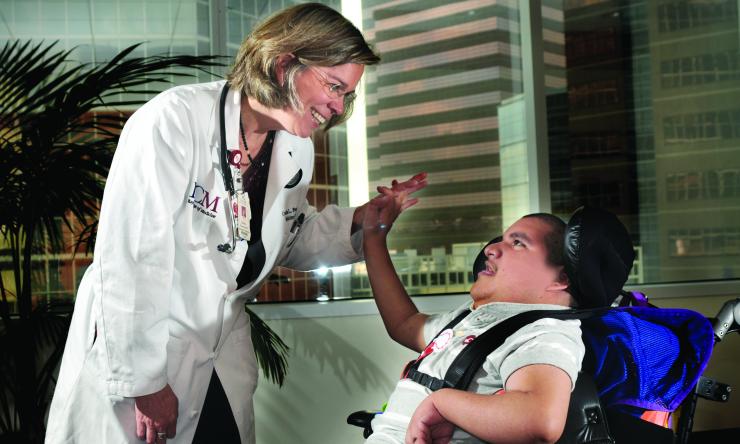 Jose Monzoro sees Dr. Peacock at the Transition Medicine Clinic for support in managing his cerebral palsy.