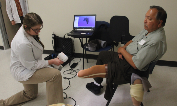 O & P student with a patient.