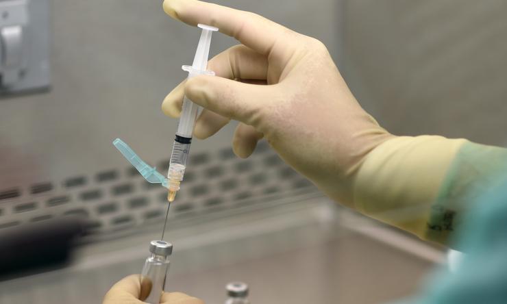 Researcher in a vaccine testing lab